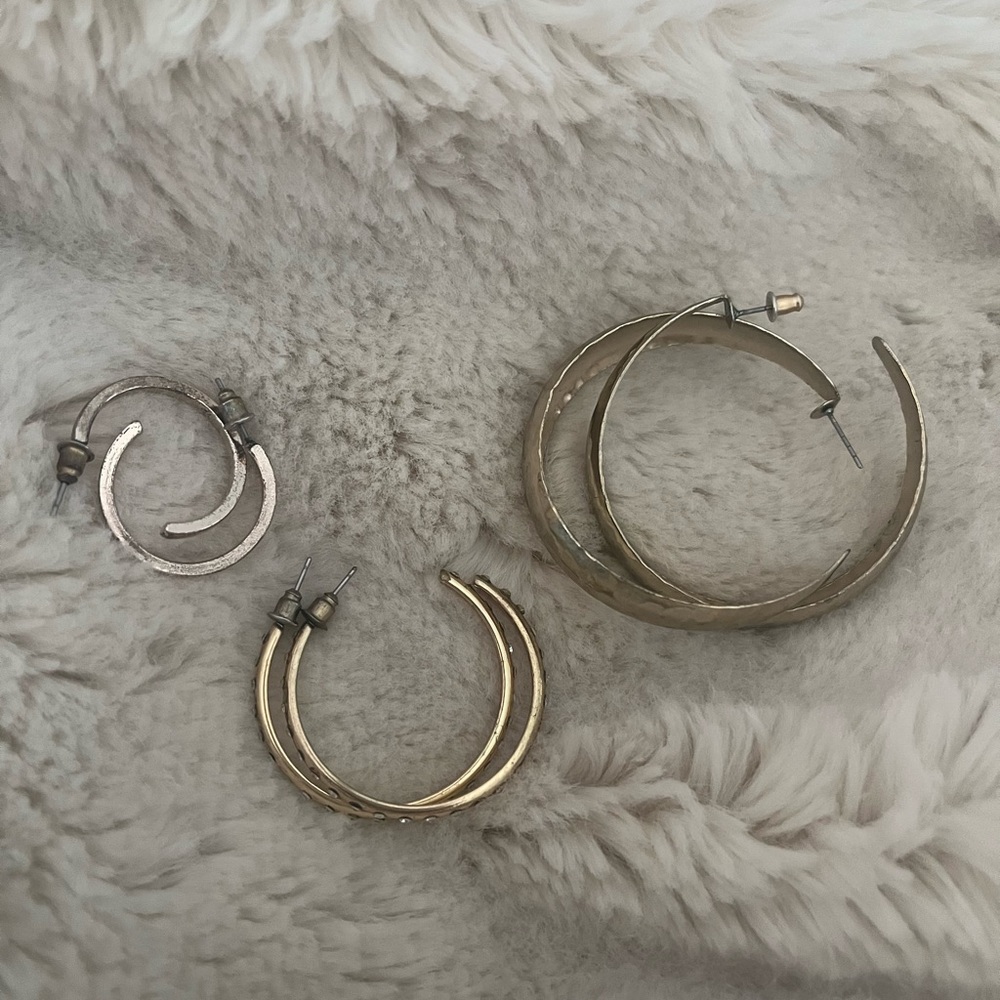 3 for 1 deal! Gold colored hoop earrings.